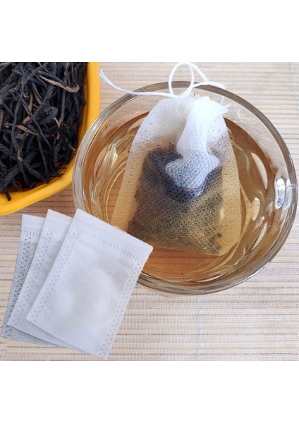 Beyaz Stil 100 Adet Tek Kullanımlık Çay Poşeti Filtre Torbaları Çay Demlik Filtre Torbaları Ipek Iplik Sızdırmazlık Dokumasız Filtre Torbaları Mutfak Aksesuarları (Yurt Dışından) fırsatları