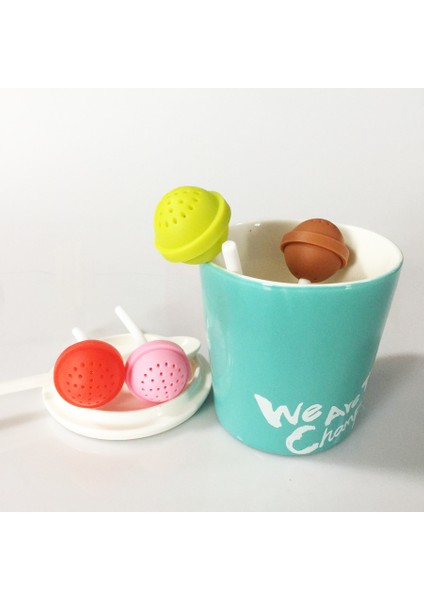 Yeşil Stil Yaratıcı Lolipop Şekilli Silikon Tatlı Çay Süzgeci Candy Lolipop Kuru Yapraklı Kupa Süzgeci Çay ve Kahve Içecekleri Için (Yurt Dışından) fiyatları