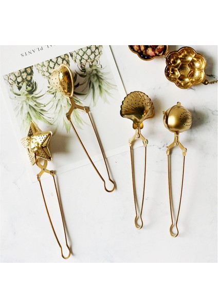 Stil 4 Stil Paslanmaz Çelik Çay Süzgeci Yeniden Kullanılabilir Metal Kabuk Kalp Yıldız Desenli Çay Süzgeci Mutfak Aleti Filtre Demlik Demlik Çaydanlık (Yurt Dışından) fiyatları