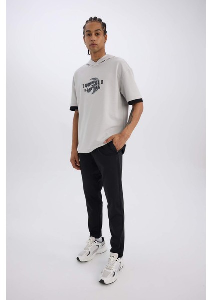 DeFactoFit NBA Toronto Raptors Oversize Geniş Kalıp Kapüşonlu Kısa Kollu Tişört B3883AX25SP