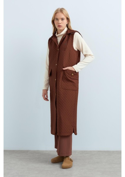 Ince Kapitone Torba Cepli Uzun Yelek Kahve modelleri