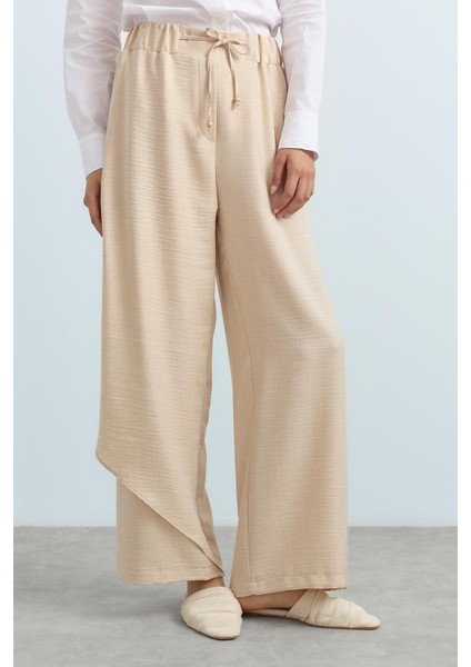 Parça Detaylı Bol Paça Pantolon Bej fiyatları