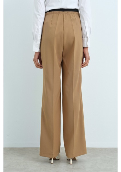 Beli Lastikli Ütü Izli Bol Paça Pantolon Camel modelleri