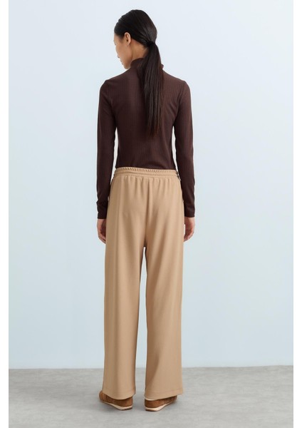 Beli Lastikli Bol Paça Örme Pantolon Camel fırsatları