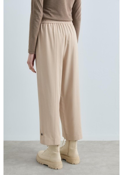 Paçası Düğmeli Pantolon Taş fırsatları