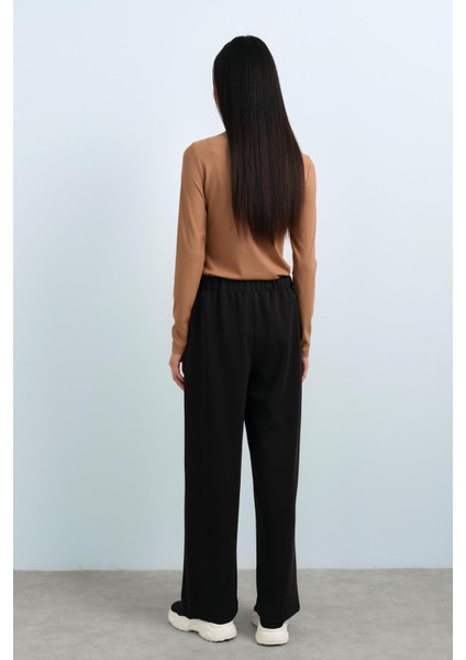 Beli Lastikli Bol Paça Örme Pantolon Siyah fırsatları