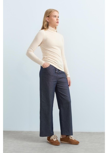 Beli Lastikli Bol Paça Pantolon Indigo fiyatları