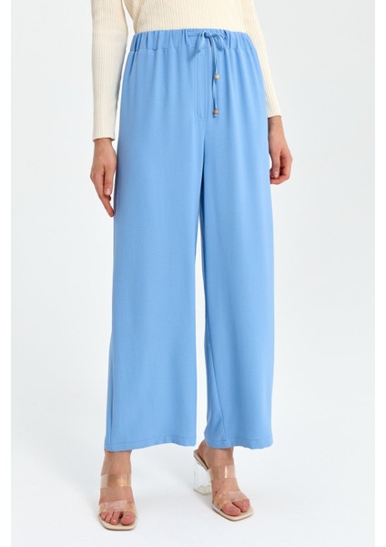 Beli Lastikli Bol Paça Pantolon Açık Mavi fırsatları