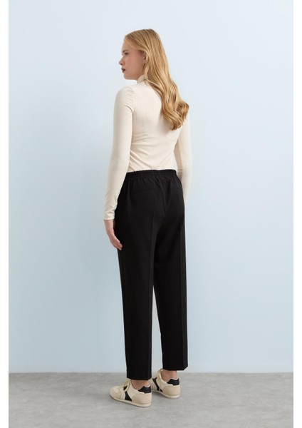 Nnihan Beli Lastikli Havuç Pantolon Siyah fırsatları