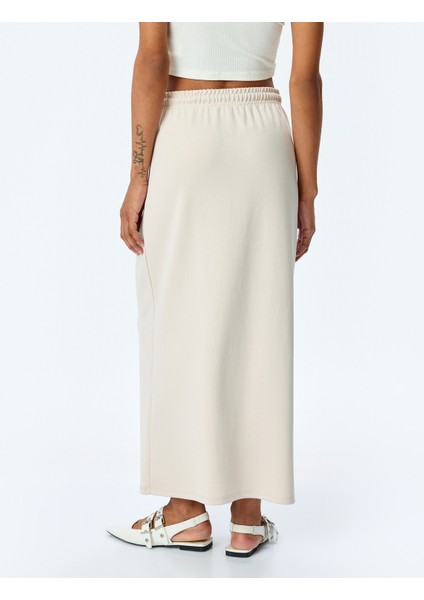 Modal Karışımlı Oversize Beli Bağcıklı Midi Etek fırsatları