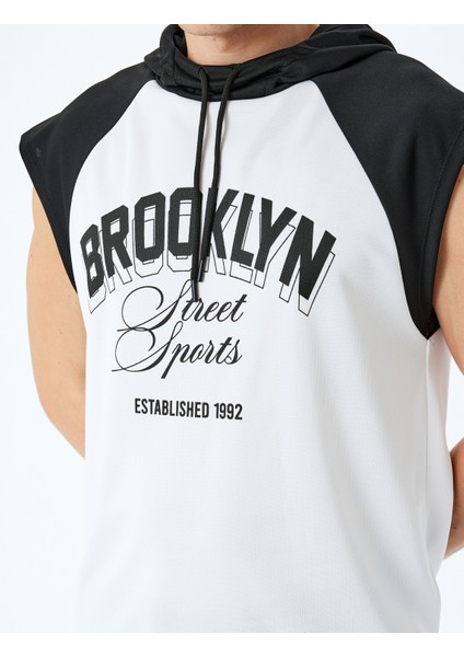 Slogan Baskılı Renk Kontrastlı Kapşonlu Kolsuz Spor Atlet indirimleri