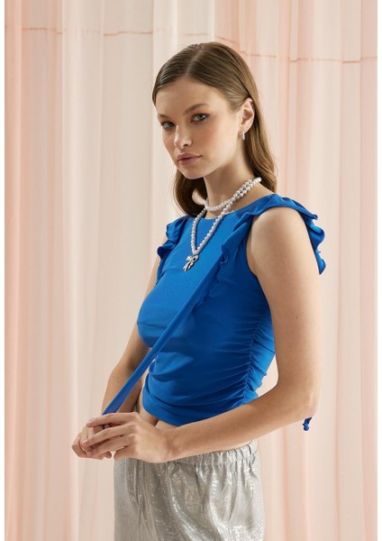 Kadın Mavi Renk Kolları Fırfırlı Sıfır Kol T-Shirt fiyatları