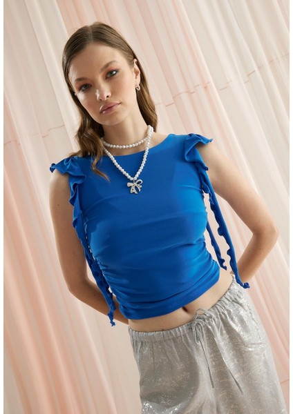 Kadın Mavi Renk Kolları Fırfırlı Sıfır Kol T-Shirt modelleri