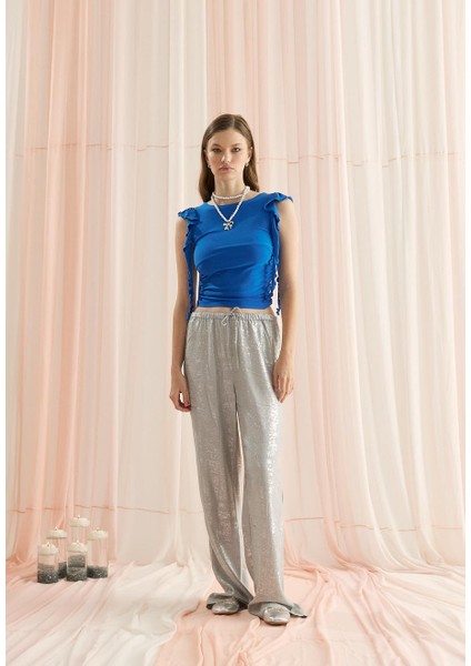 Kadın Mavi Renk Kolları Fırfırlı Sıfır Kol T-Shirt indirimleri