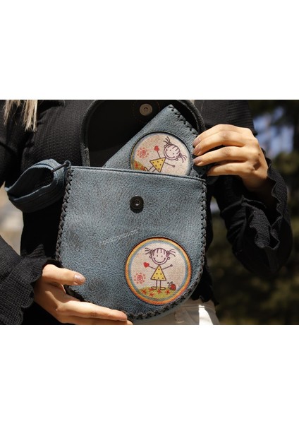 Cin Ayşe Figürlü Tasarımlı Capraz Örgulu Kol Cantası Petrol ve Cuzdan Petrol Kombin fırsatları