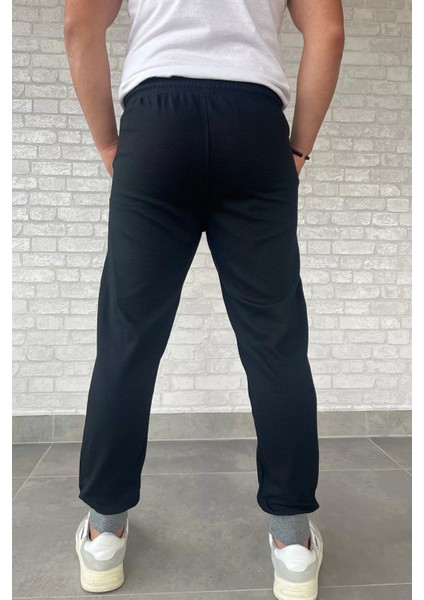 Erkek Paça Ribanalı Yazı Baskılı Jogger Eşofman Altı