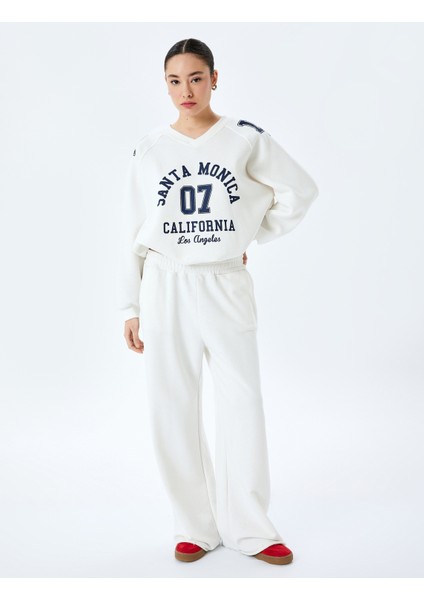 Kolej Baskılı Uzun Kollu Oversize V Yaka Sweatshirt fiyatları