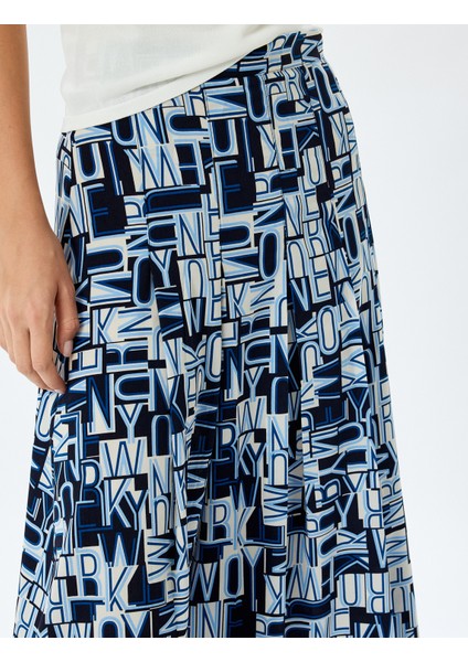 Desenli Kalın Piliseli Oversize Midi Boy Etek indirimleri