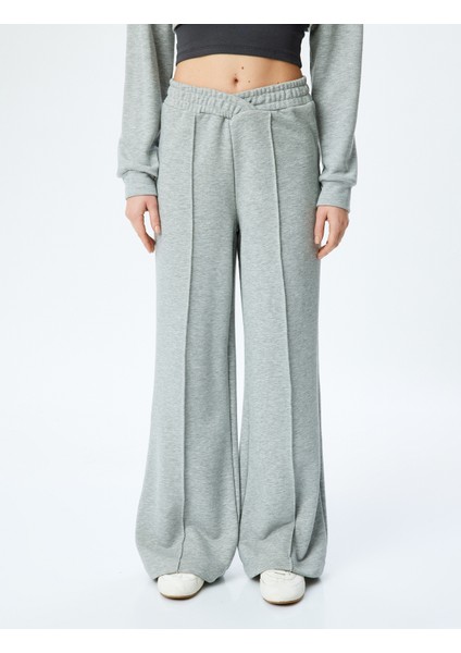 Asimetrik Bel Detaylı Nervürlü Geniş Paça Eşofman Altı modelleri