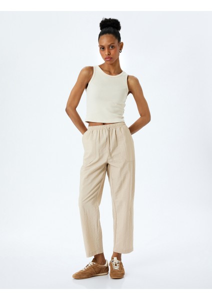 Beli Bağlamalı Cepli Balon Form Pantolon