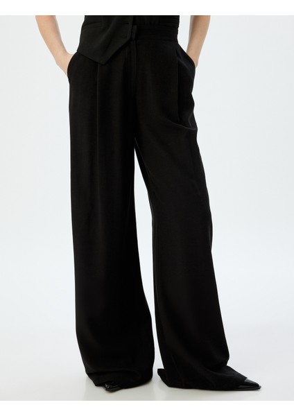 Keten Karışımlı Cepli Geniş Paça Baggy Kumaş Pantolon modelleri