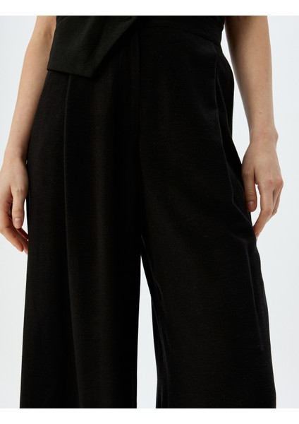 Keten Karışımlı Cepli Geniş Paça Baggy Kumaş Pantolon indirimleri