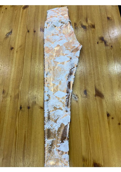 Altın Varaklı Kendinden Desenli Deri Görünümlü Kumaş Spor Tayt indirimleri