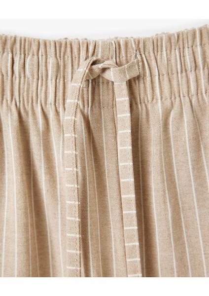 Viskon Karışımlı Beli Bağcıklı Çizgili Bol Paça Pantolon fırsatları