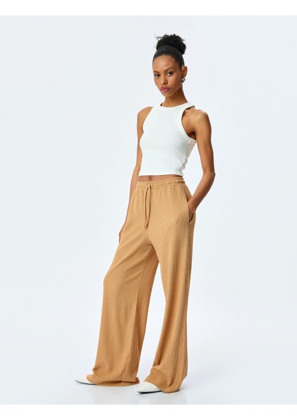 Beli Bağcıklı Dokulu Yüksek Bel Geniş Paça Pantolon fiyatları