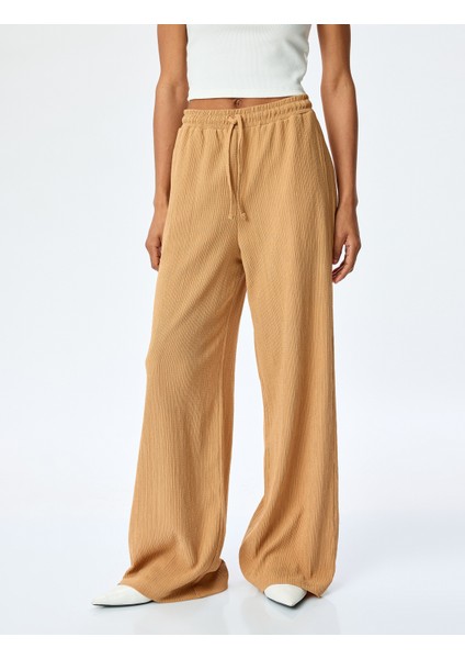 Beli Bağcıklı Dokulu Yüksek Bel Geniş Paça Pantolon modelleri