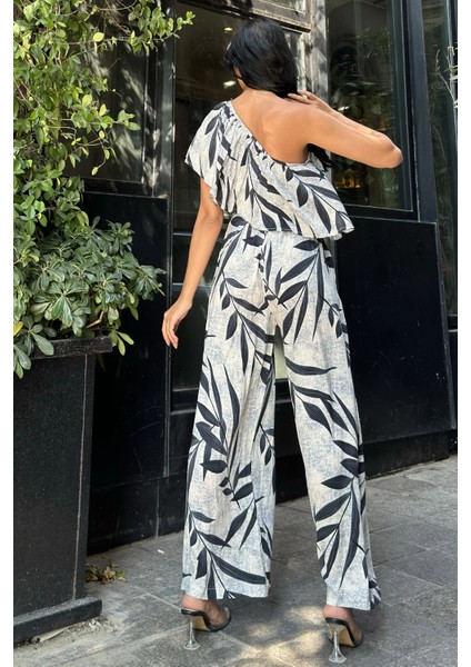 Siyah Desenli Tek Omuz Kuşaklı Viskon Tulum modelleri