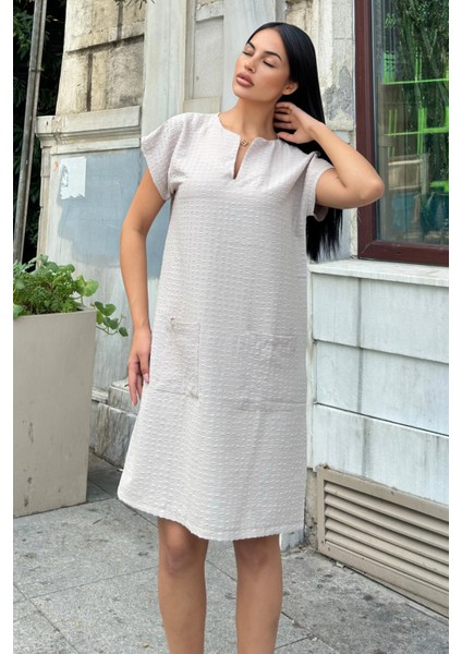 Bej Lotus Dokulu Cep Detaylı Midi Elbise indirimleri