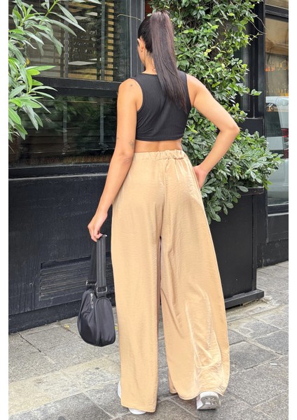 Kadın Karamel Beli Lastikli, Cepli, Bol Paça Özel Kumaş, Rahat Kalıp Pantolon - Tesettüre Uygun modelleri