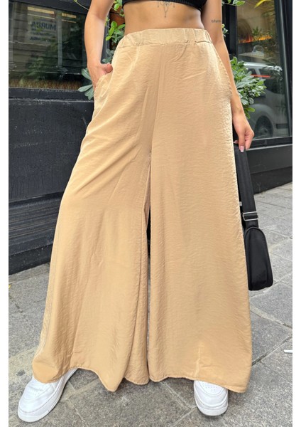 Kadın Karamel Beli Lastikli, Cepli, Bol Paça Özel Kumaş, Rahat Kalıp Pantolon - Tesettüre Uygun fırsatları