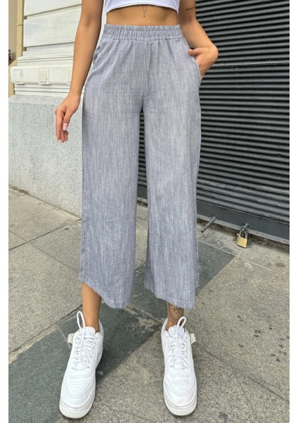 Kadın Siyah Lastikli Yüksek Bel, Cepli, Yırtmaçlı, Geniş Paça, Salaş Keten Kapri Pantolon fiyatları