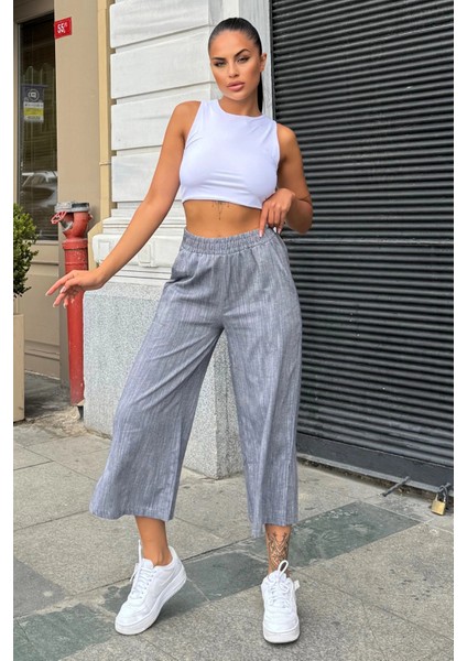 Kadın Siyah Lastikli Yüksek Bel, Cepli, Yırtmaçlı, Geniş Paça, Salaş Keten Kapri Pantolon modelleri