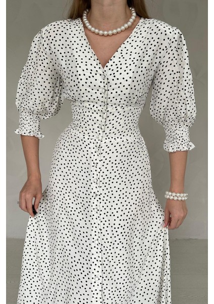 Arka Bel ve Kol Ucu Gipeli Elbise fiyatları