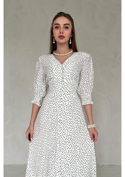 Arka Bel ve Kol Ucu Gipeli Elbise modelleri