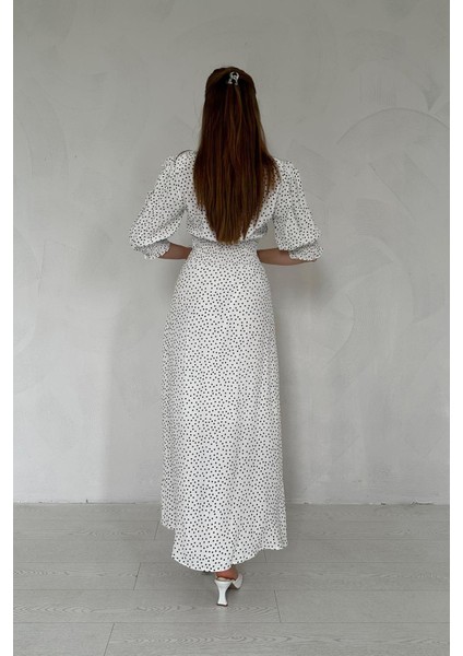 Arka Bel ve Kol Ucu Gipeli Elbise fırsatları