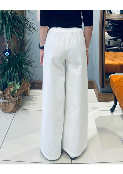 Beli Lastikli ve Bağcıklı Pantolon.