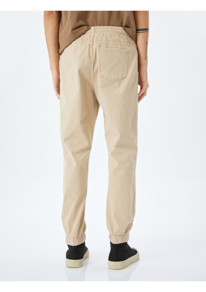 Kanvas Pamuklu Beli Bağcıklı Chino Cep Detaylı Jogger Pantolon fırsatları