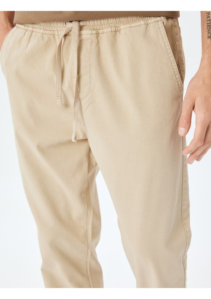 Kanvas Pamuklu Beli Bağcıklı Chino Cep Detaylı Jogger Pantolon indirimleri