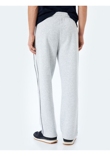 Fermuarlı Cepli Dikiş Detaylı Pamuk Karışımlı Beli Bağcıklı Eşofman Altı fırsatları