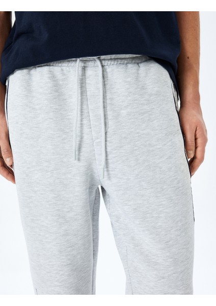 Fermuarlı Cepli Dikiş Detaylı Pamuk Karışımlı Beli Bağcıklı Eşofman Altı indirimleri