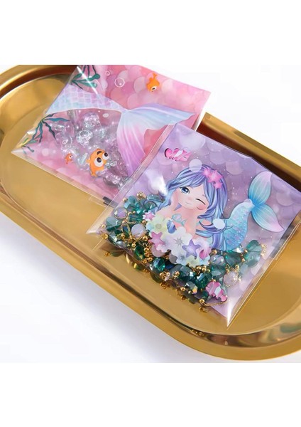 Bantlı Şeffaf Desenli Poşet Opp 10X10 (+3) cm 95 Adet