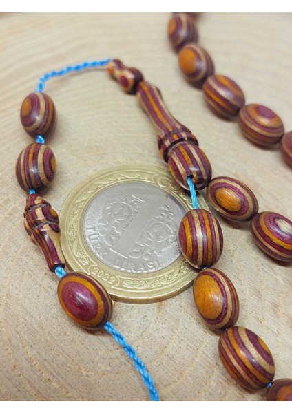 Kafur Ağacı Badem Kesim 33LÜK Tesbih 6.5*9mm (55830) modelleri