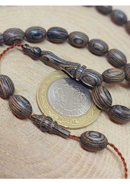 Kafur Ağacı Badem Kesim 33LÜK Tesbih 6.5*9mm (55832) modelleri