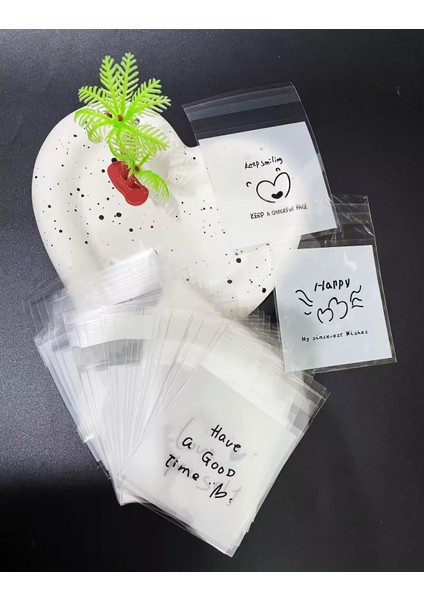 Bantlı Şeffaf Desenli Poşet Opp 10X10 (+3) cm 95 Adet