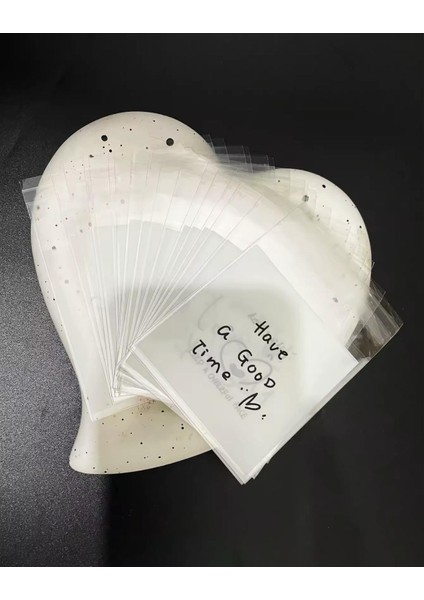 Bantlı Şeffaf Desenli Poşet Opp 10X10 (+3) cm 95 Adet modelleri