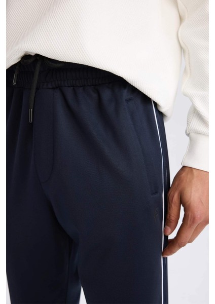 Fit Sporcu Jogger Eşofman Altı Slim Fit Dar Kesim Standart Paça Skuba Dalgıç Kumaş Beli Lastikli E3931AX24WN indirimleri